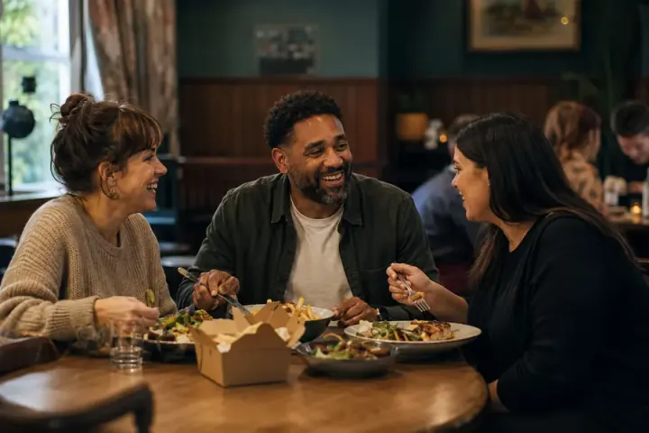 Friends enjoying a relaxed casual dinner together